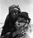 Shammar Bedouin at Jumaima, woman and child