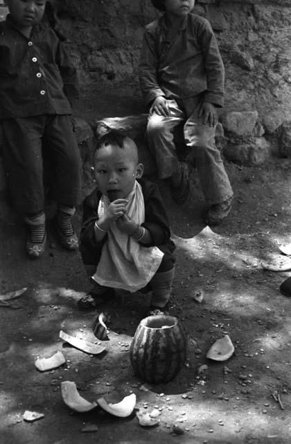 Yutaoho, Shansi, July 1935, child and melon