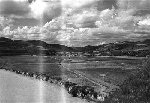 Landscape with river, trees, and hills