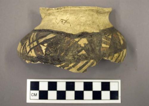 Fragment of small polychrome pottery jar - restored