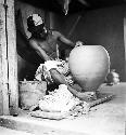 Jose Maria Cab making a tinaja on a kabal