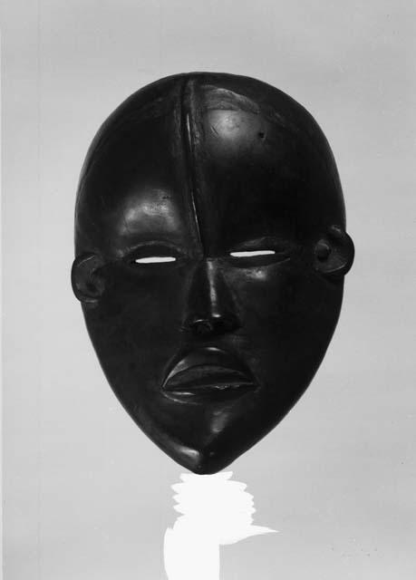 Wooden mask, property of George Harley