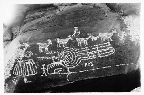 Petroglyph, animal and human figures