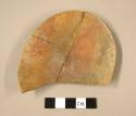 Oblong pottery dish or implement made from red on orange sherd