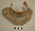 Fragments of neck of pottery jar, restored. Jeddito black-on-orange