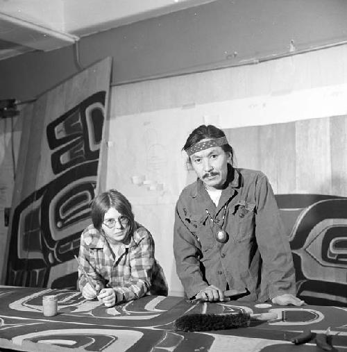 Nathan Jackson and Dorica Jackson at work, carving wood