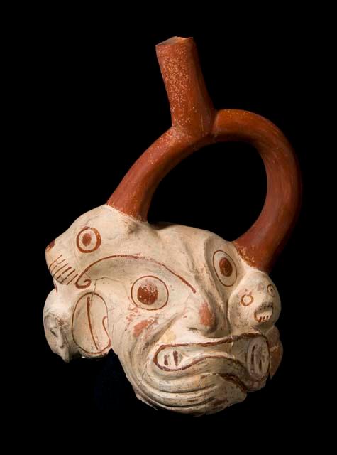 Stirrup-spout vessel in the form of a grotesque face