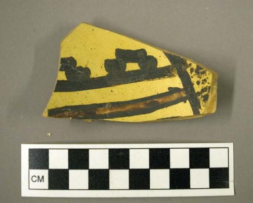 Polychrome potsherd showing unusual exterior surface treatment