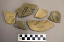 Fragments of large potsherd. Decorated, coarse, rough