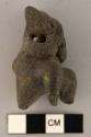 Small black pottery seated figurine - armadillo