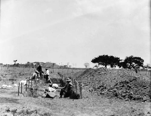 View of third day of men working in first trench