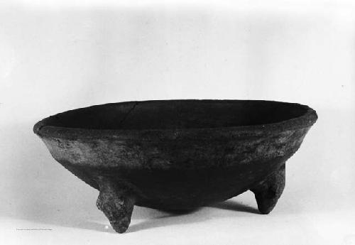 Pottery tripod bowl, profile view