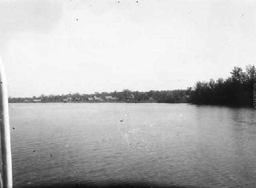 View of rural settlement along riverbank