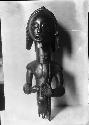 Figurine of male god with child