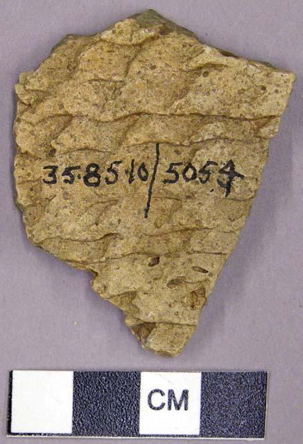 Corrugated potsherd