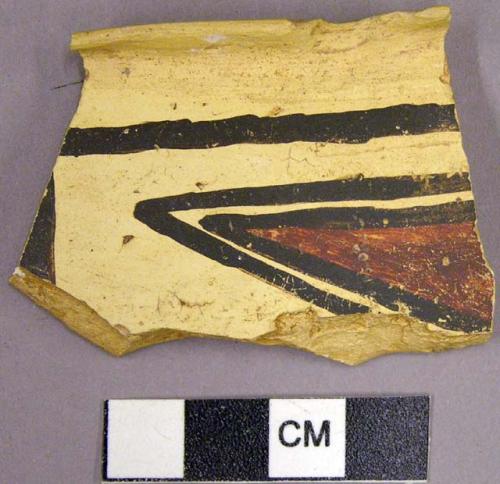 Decorated rim potsherd