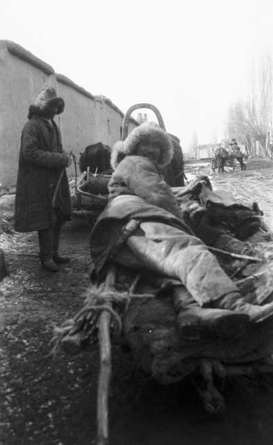 Kazak (Qazaq) lying on sledge