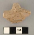 Terra cotta stamp (fragment)