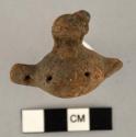 Pottery whistle from grave