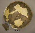 Jeddito black on orange pottery bowl--restored