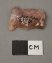 Stone projectile point, side notched, broken