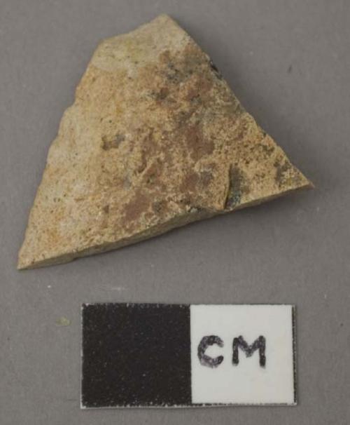 Stone, bifacially worked fragment