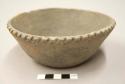 Bowl with notched rim