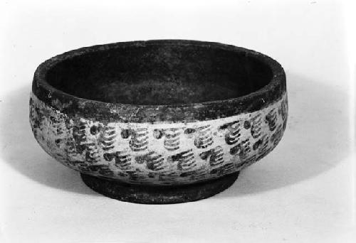 Red on buff bowl with ring base from grave 31, number 27