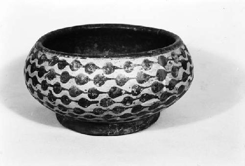 Red on buff bowl with ring base from grave 31, number 35