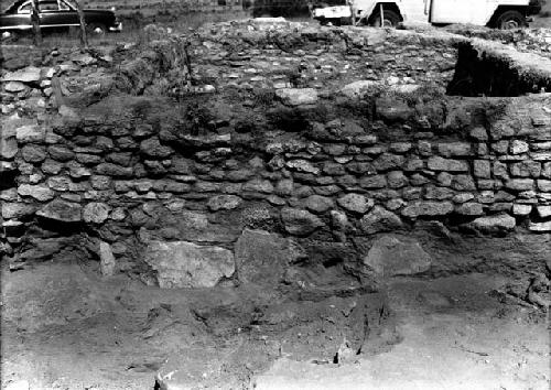 View of excavation site, and shots of artifacts