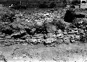 View of excavation site, and shots of artifacts