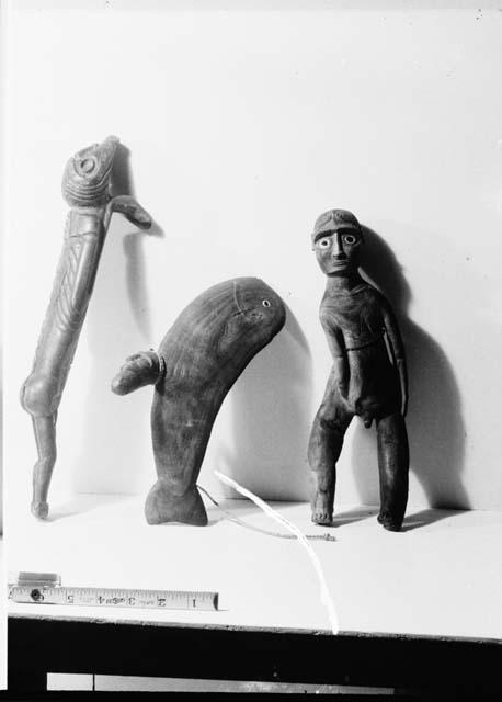 Wooden figures, human, fish, and animal
