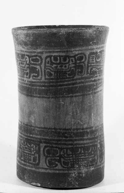 Jar with rows of glyphs