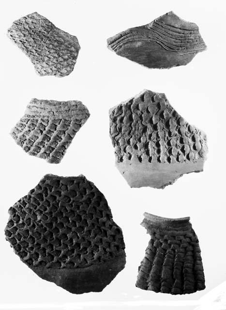 Potsherds showing corrugations on necks of ollas