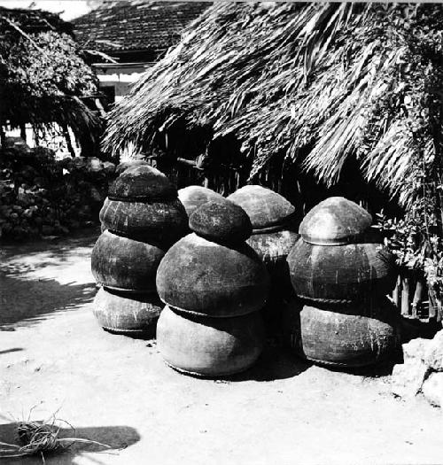 Pile of cum or ollas which had been used for a recent fiesta