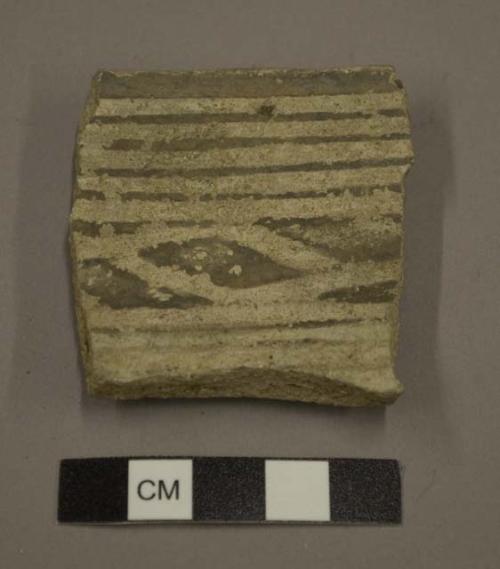 Black-on-white potsherd