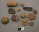 Fragments of terra cotta objects and small limestone ball