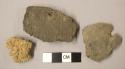 Ceramic body sherds, one perforated, one with punctations, texture surface