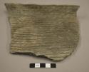 Sherd of corrugated pottery jar