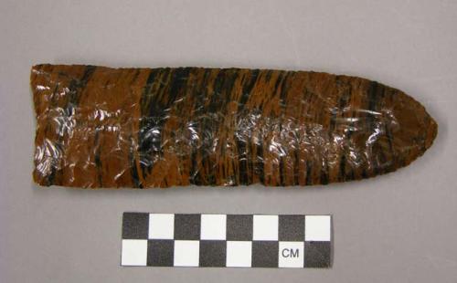 Chipped implement, mottled obsidian