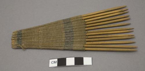 Comb - pieces of wood held together of string. Chisakulu