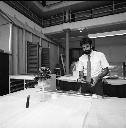 Rick Riccio, exhibit designer, working on Hall of North American Indian