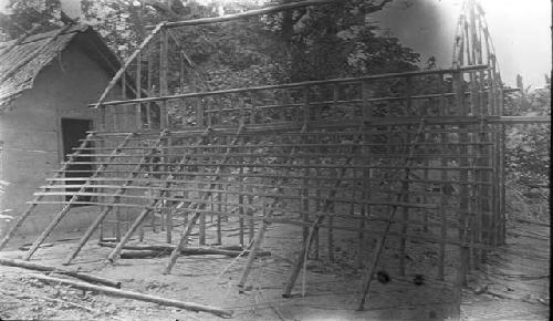 Hut construction process, Wooden framework ready for mud