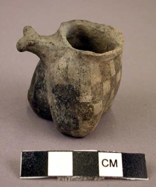 Whole miniature pot with effigy head