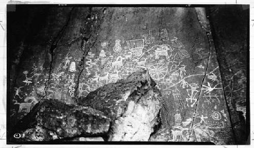 Petroglyph: a group called "Utah's First Newspaper"