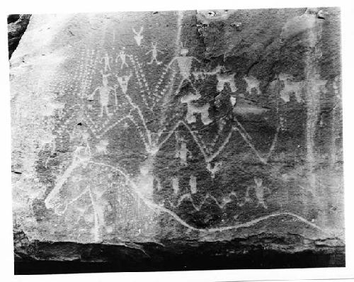 Petroglyph, animal and human figures