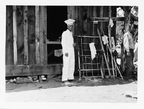 Photo of S.C. Mills, esq.- cook. Black's Dry Farm cabin