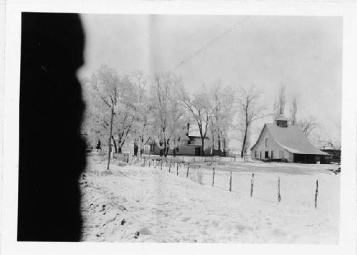 Frost and farm buildings near Cortez