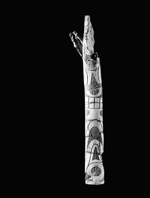 Bone with incised decoration