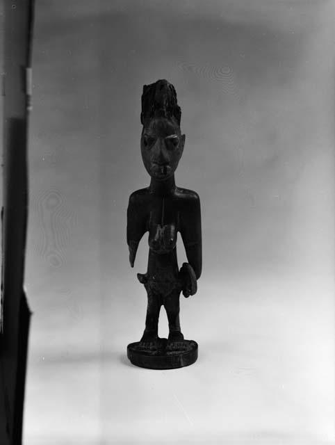 Female Ibeji of wood